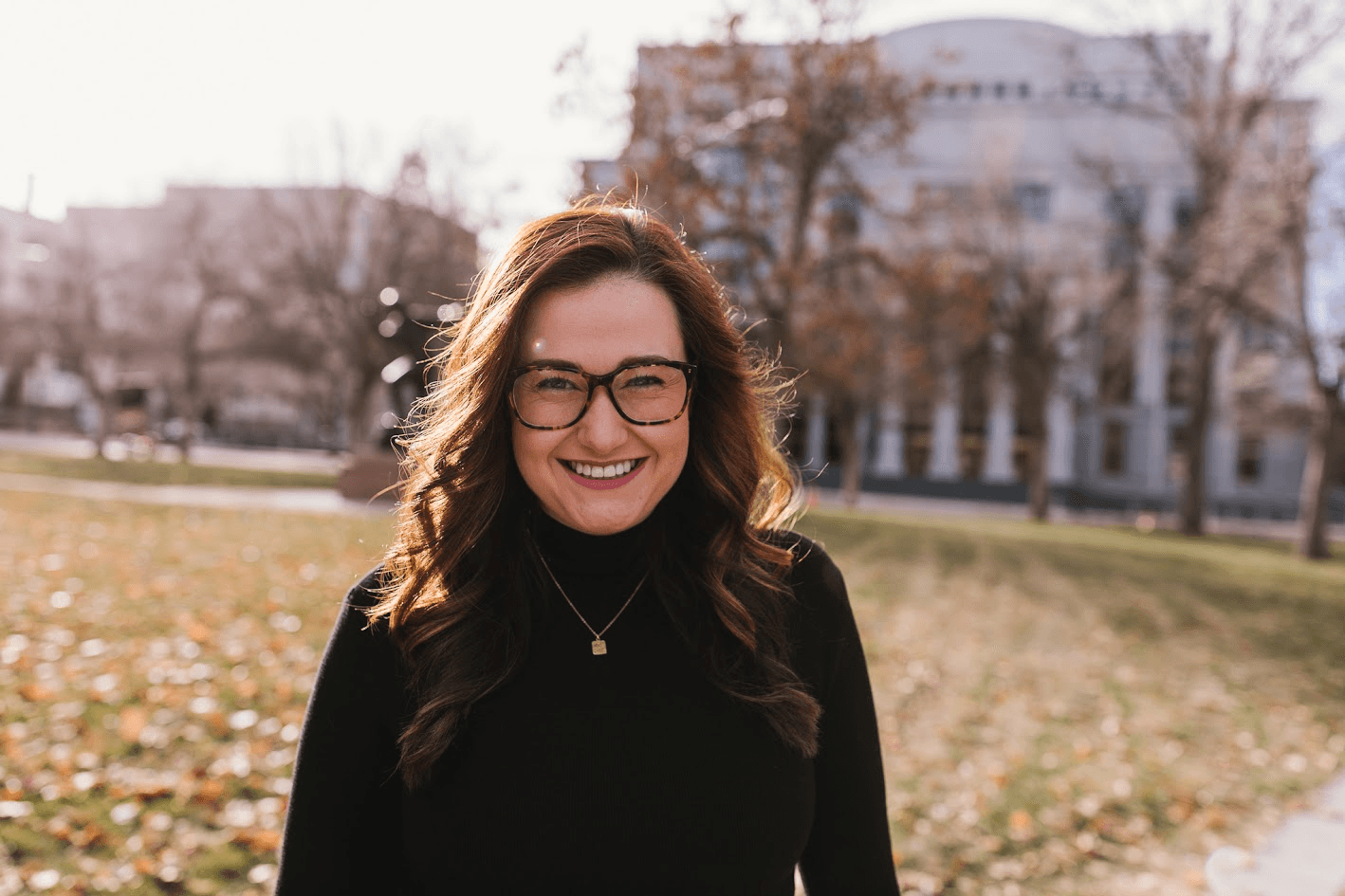 Parker smiling in a Denver park
